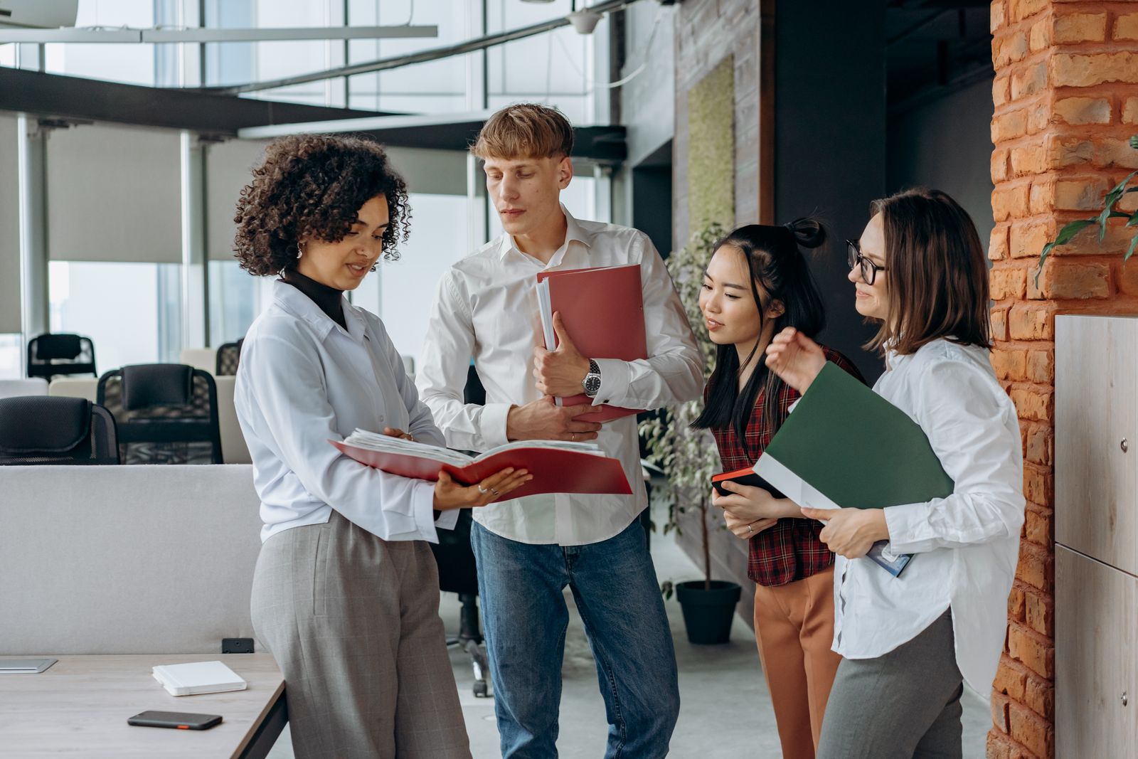 A group of young professionals in an office